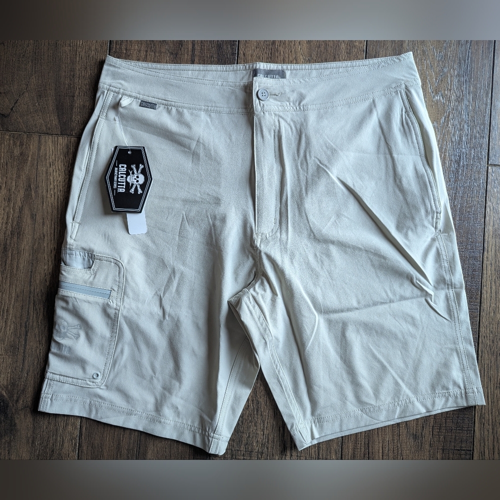 Calcutta Mens Khaki Hybrid Board Shorts Zip Pockets Size 36 NWT Casual Active